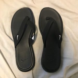 Nike black flip flops